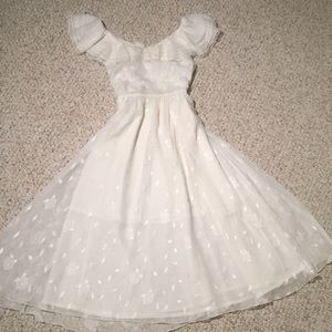 White midi dress with rose embroidery